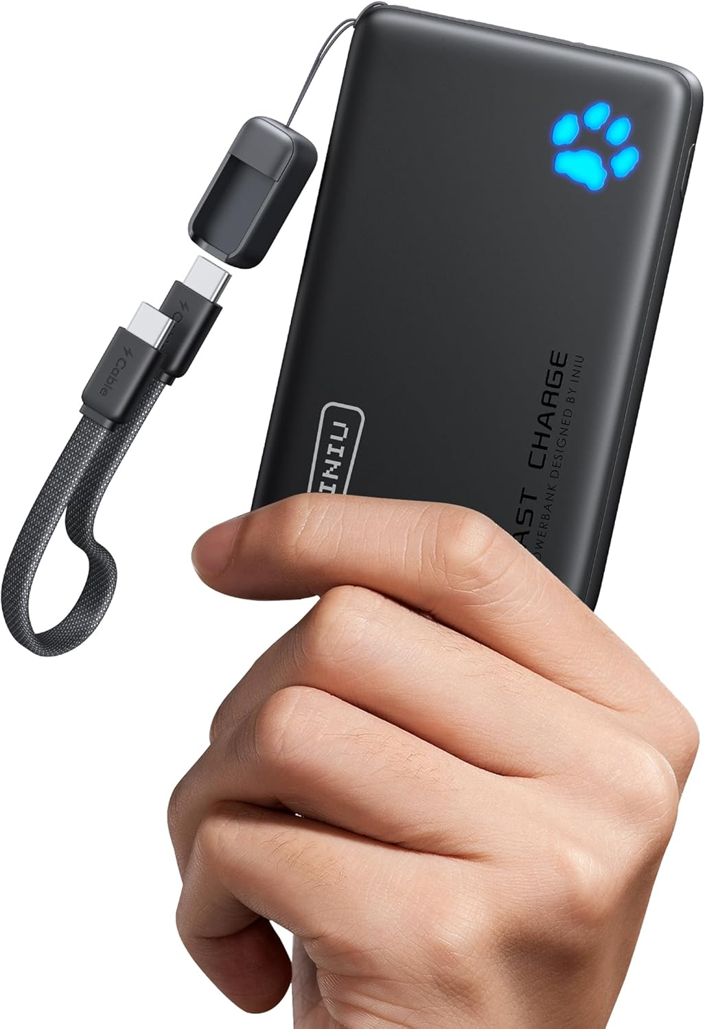 black hand held charger being held in hand